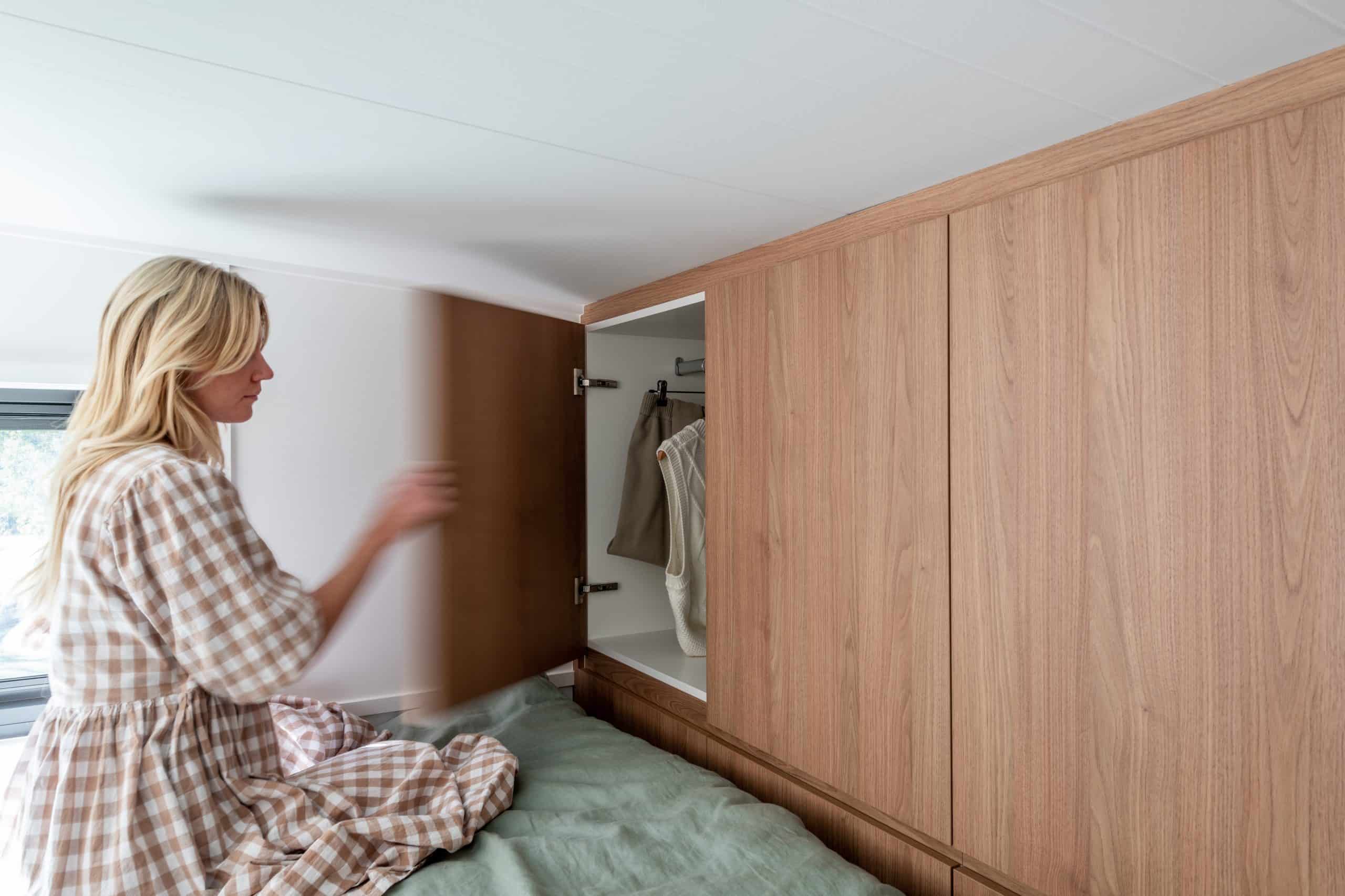 Accessing the full-width loft bedroom storage